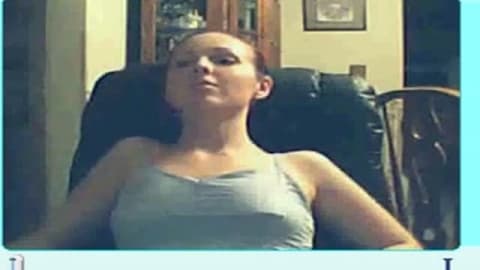 Sexy brunette gets going in front of a camera