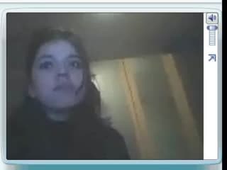 Pretty brunette films herself on webcam