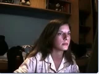 Young girl shows up in front of her webcam