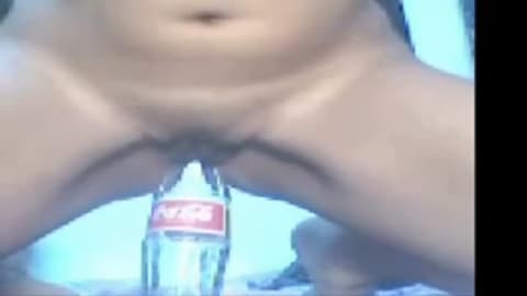 This kinky minx loves to use cola bottles